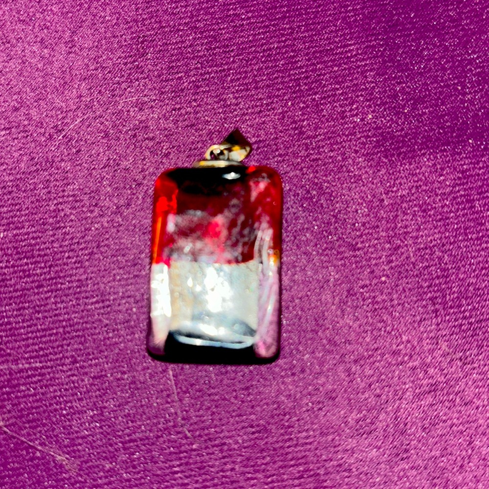 Red and black silver charm